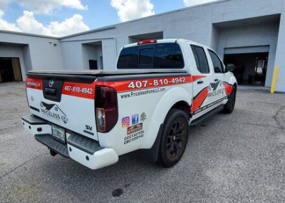 Priceless Custom Vehicle Wrap by Visual Signs and Graphics in Orlando
