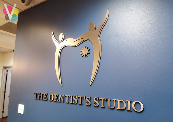 The Dentist's Studio custom lobby signs by Visual Signs and Graphics in Orlando