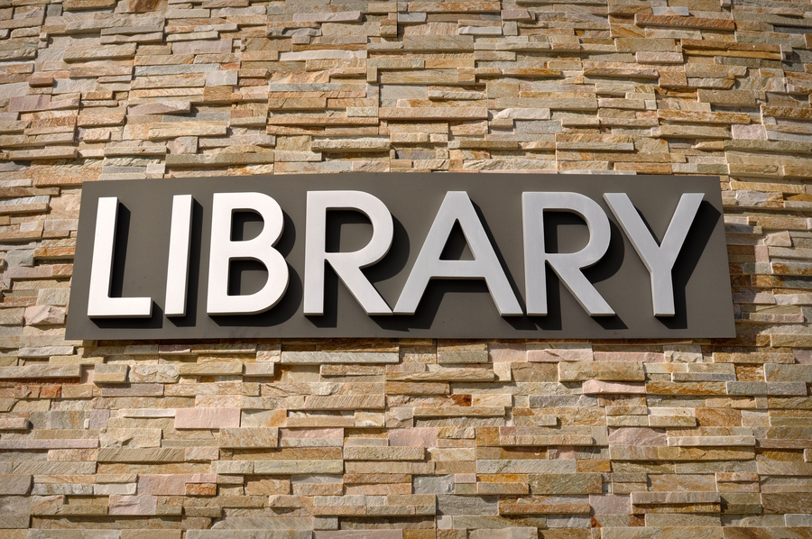 architectural signage - library written on wall